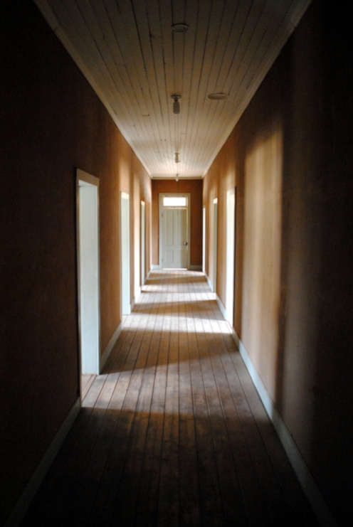 Creepy hallway of the old hotel.